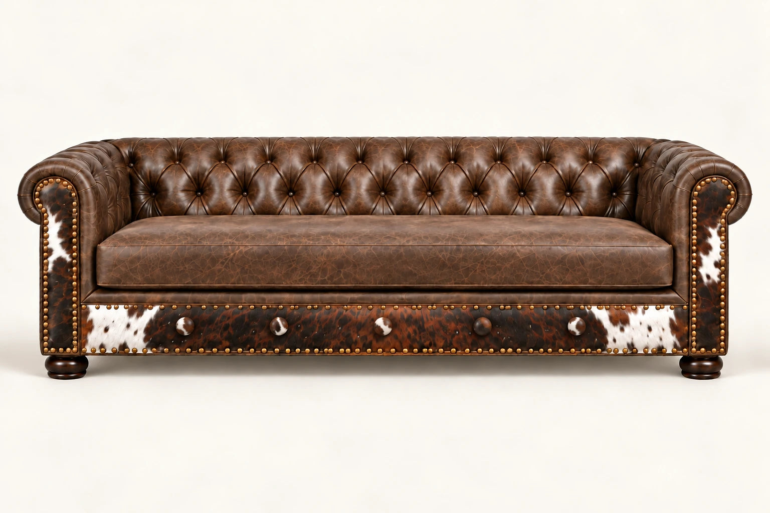 The Original Mack Daddy sofa with a tufted leather back, rolled arms and cowhide front panels on the Cowboss 86-inch frame